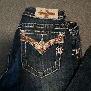 Miss me cow print bootcut jeans